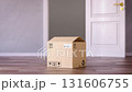 Express delivery concept. Stopwatch in a cardboard box in fron of open door. 3d animation 131606755