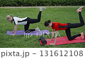 Fitness workout in the park with friends 131612108