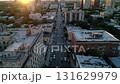 Business district of a large evening city during sunset. 131629979