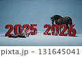 Snake lies near volumetric number 2025, horse stands next to 3D inscription 2026. Comparison Of Consecutive Zodiac Cycles. End of old year Beginning of new year concept. Blue cyclorama in the studio 131645041