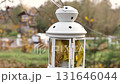 Autumn Leaves Inside White Decorative Lantern 131646044