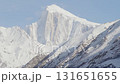 A breathtaking view of a snow-capped mountain in the Karakoram Range, Pakistan, captured during early morning with clear skies 131651655
