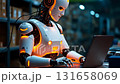A humanoid robot operates a computer in a bustling warehouse filled with boxes. The ambient lighting highlights the robot's design as it processes data in a modern environment. 131658069