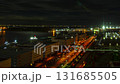 青海埠頭から見た夜の羽田空港着陸機の光跡タイムラプス　左から右　パン映像　4k60p 131685505