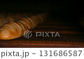Baked loaf of bread in a bakery. 131686587