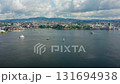 Drone Zoom Toward Ferry Crossing Oslofjord with Oslo City and Islands in View 131694938
