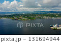 Wide Angle Aerial of Oslo Waterfront and Downtown with Distant Mountain Backdrop 131694944