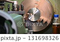 Slow motion scene the lathe machine operation. The metalworking process by turning machine. 131698326