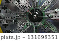 Slow motion scene operation of the wire coil spring making machine. The mechanical parts manufacturing concept. 131698351