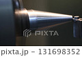 Pan scene the turning process with the metal cone shape parts on lathe machine. The parts measurement on turning machine by machine operator. 131698352