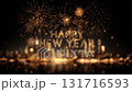 Fireworks display celebrating the arrival of the new year over a vibrant city skyline at midnight 131716593