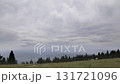 Time lapse of cloudy skies over the hillside of the Schoeckl north of Graz, Austria 131721096