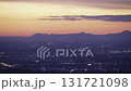 Stunning dawn timelapse over the mountains and city of Vienna with vibrant colors in the morning sky 131721098