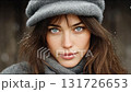 Beautiful woman under small falling snowflakes 131726653