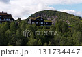Aerial footage of a norwegian house with a traditional turf roof 131734447