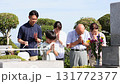 a visit to a grave  131772377