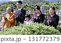 Bereaved family attending the bone-laying ceremony 131772379