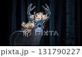 Majestic whitetail deer buck with frosty antlers breathing in a cold dark winter forest 131790227