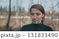woman crying in the woods 131833490