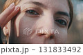 woman fondle her cheek 131833492