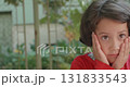 worried short haired girl 131833543