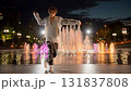 Illuminated fountain and street dancing 131837808