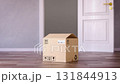 Express delivery concept. Opening empty cardboard box in front of open door.. 3d animation 131844913