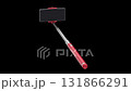 Smartphone on selfie stick on black background 131866291