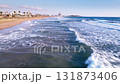 Drone Flight Over the Mediterranean Sea with Waves Passing by Long Beach in Iskele, Northern Cyprus - 15 Jun 2024 131873406
