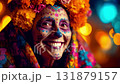 Man dressed for Dia de Muertos celebration in Mexico during sunset with elaborate calavera makeup 131879157