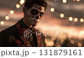 Man dressed for Dia de Muertos celebration in Mexico during sunset with elaborate calavera makeup 131879161