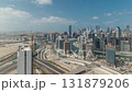 Panorama showing skyline of Dubai with business bay and downtown district timelapse. 131879206