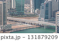 Skyline with modern architecture of Dubai business bay towers timelapse. Aerial view 131879209