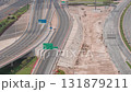Top view city traffic on a big crossroad in Business bay timelapse. 131879211