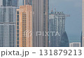 Panoramic skyline of Dubai with business bay and downtown district timelapse. 131879213