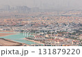 Aerial view of many apartment houses in Dubai city from above timelapse 131879220