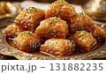 Extreme close-up of a piece of golden Baklava, a traditional Middle Eastern or Mediterranean dessert 131882235