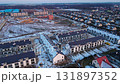 Aerial view of residential housing construction in winter 131897352