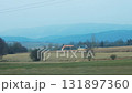 Countryside view from car window during road trip 131897360