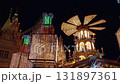 Christmas fair with festive lights and decorations in historic city center 131897361