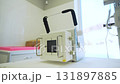 Modern veterinary X-ray device stands on glossy table 131897885