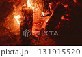 The Captivating Campfire Flames and Glowing Coals Create a Warmth in the Night Sky 131915520