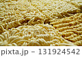 Instant noodles. Row of dehydrated ramen noodles, ready to be cooked. 131924542