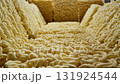 Instant noodles. Row of dehydrated ramen noodles, ready to be cooked. 131924544