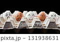 Eggs with funny faces in box. Happy, angry, sad, surprised faces. Stop motion 131938631