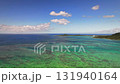 Aerial view of emerald green coral reefs and blue ocean Aerial view of emerald green coral reefs and blue ocean 131940164