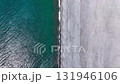 A drone descends from the sky above Enjugahama Beach in Nakaki, Wakayama Prefecture, to the shoreline. Stunning footage of the vast pebbled beach and blue ocean. A drone descends from the sky above Enjugahama Beach in Nakaki, Wakayama Prefecture, to the shoreline. Stunning footage of the vast pebbled beach and blue ocean. 131946106