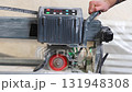 Construction Worker Using Tile Saw Cutting Machine for Home Improvement Project 131948308