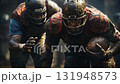 A dynamic football scene capturing the intense action and determination of players covered in mud during a game. 131948573