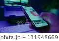 Person doom scrolling social media at night 131948669
